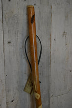 Feather carving on Walking stick 