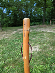 Compass carving on hicking stick