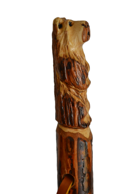 Bear carving on a walking stick made out of hickory