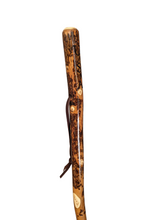 Walking stick with "USA" carved at the top of a walking stick with a leather strap. 