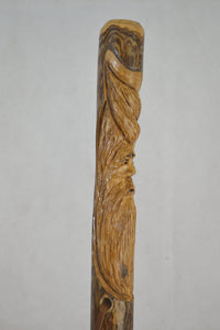 wood spirit carving on a walking stick