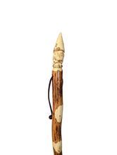 Walking stick with standing Gnome carved at the top of the stick.