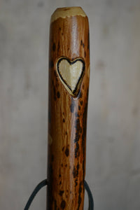 walking stick with heart carving