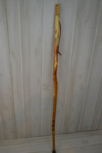walking stick with bird carving