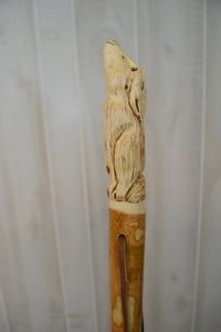 Wolf carved on hardwood walking stick